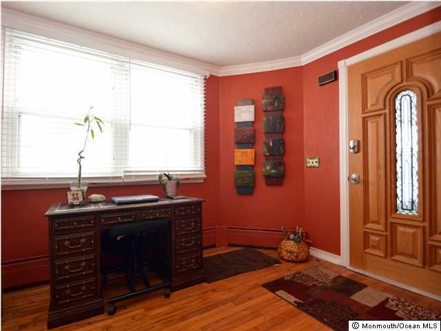 201 Forman Avenue Point Pleasant Beach, NJ 08742 - Photo 4 of 25 a view of a livingroom with furniture window and wooden floor