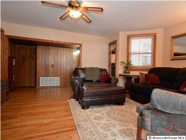 201 Forman Avenue Point Pleasant Beach, NJ 08742 - Photo 5 of 25 a living room with furniture and a window