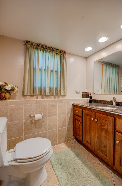 23019 South Kent Road Channahon, IL 60410 - Photo 22 of 36 a bathroom with a sink a toilet and mirror