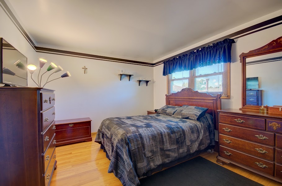 23019 South Kent Road Channahon, IL 60410 - Photo 28 of 36 a bedroom with a bed and a dresser