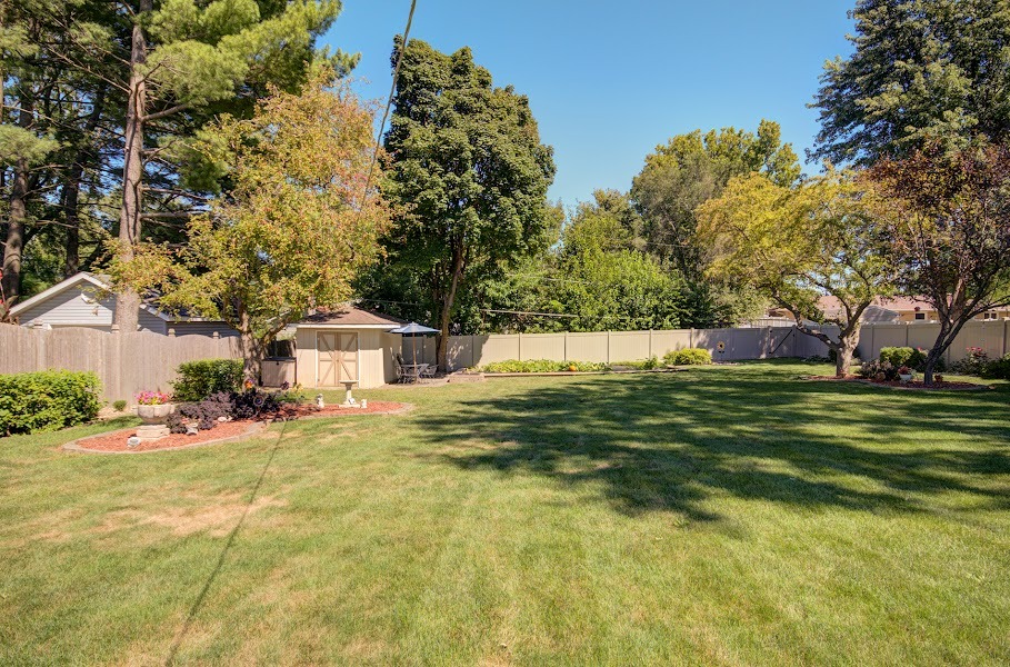 23019 South Kent Road Channahon, IL 60410 - Photo 32 of 36 a front view of a house with a yard