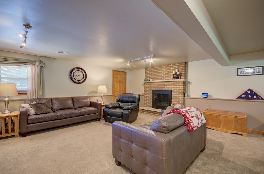 23019 South Kent Road Channahon, IL 60410 - Photo 10 of 36 a living room with furniture a fireplace