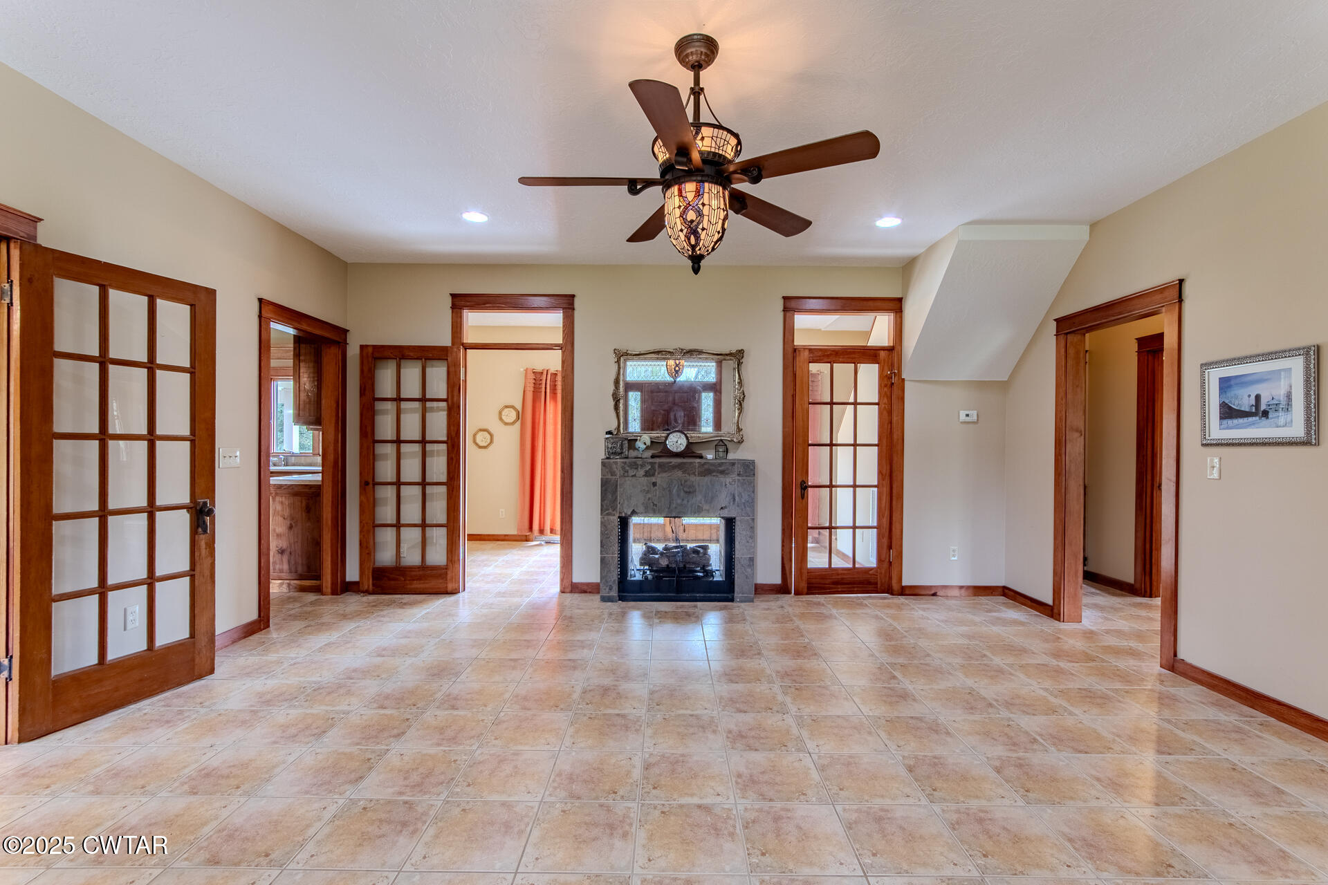 3554 Shades Bridge Road Greenfield, TN 38230 - Photo 5 of 49 a view of an empty room with window and a ceiling fan