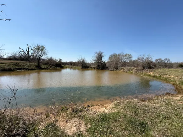 a view of swimming pool and mountain in back