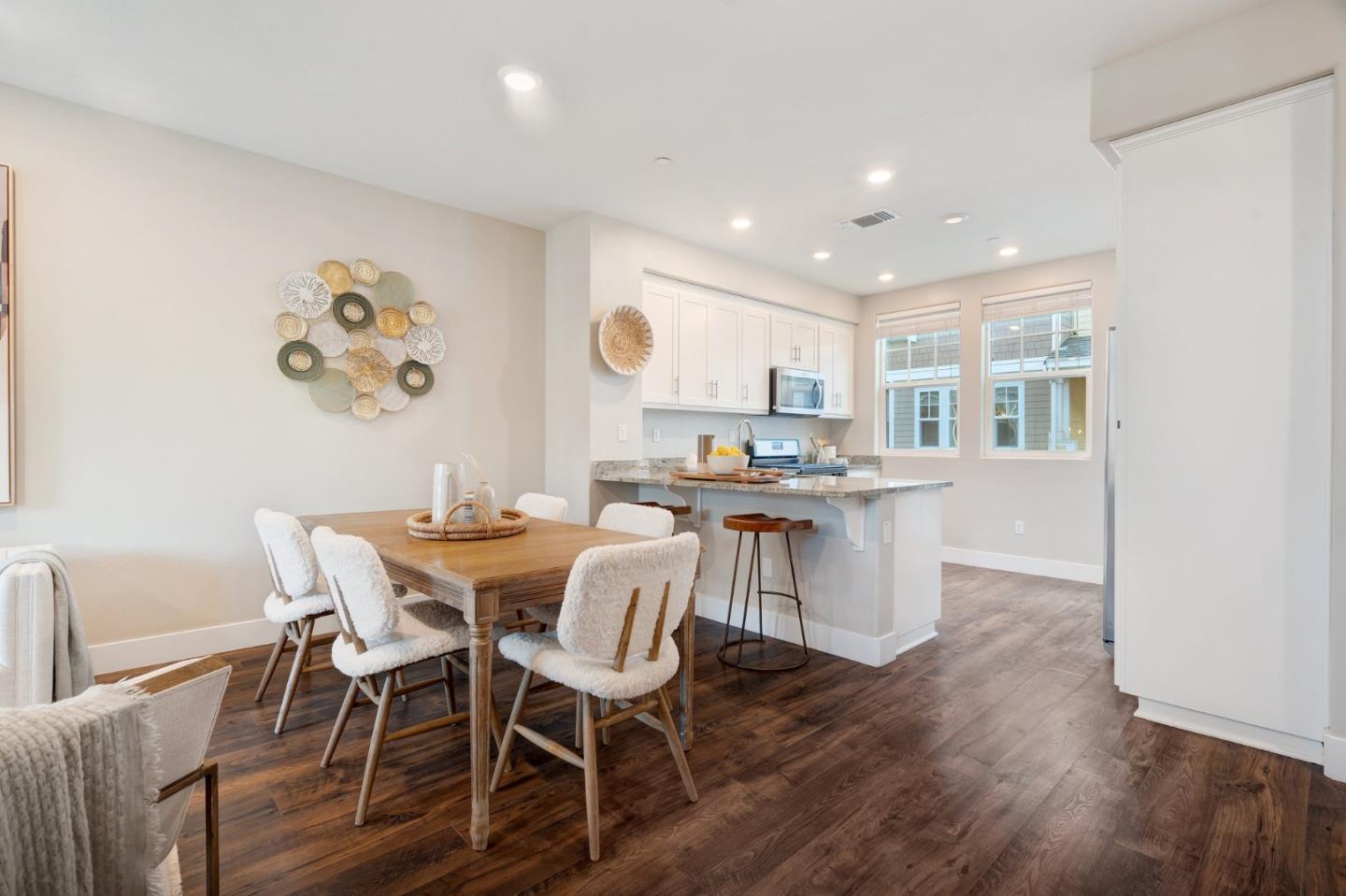 3911 Degree Lane Mountain View, CA 94043 - Photo 11 of 54 a view of a dining room with furniture and wooden floor