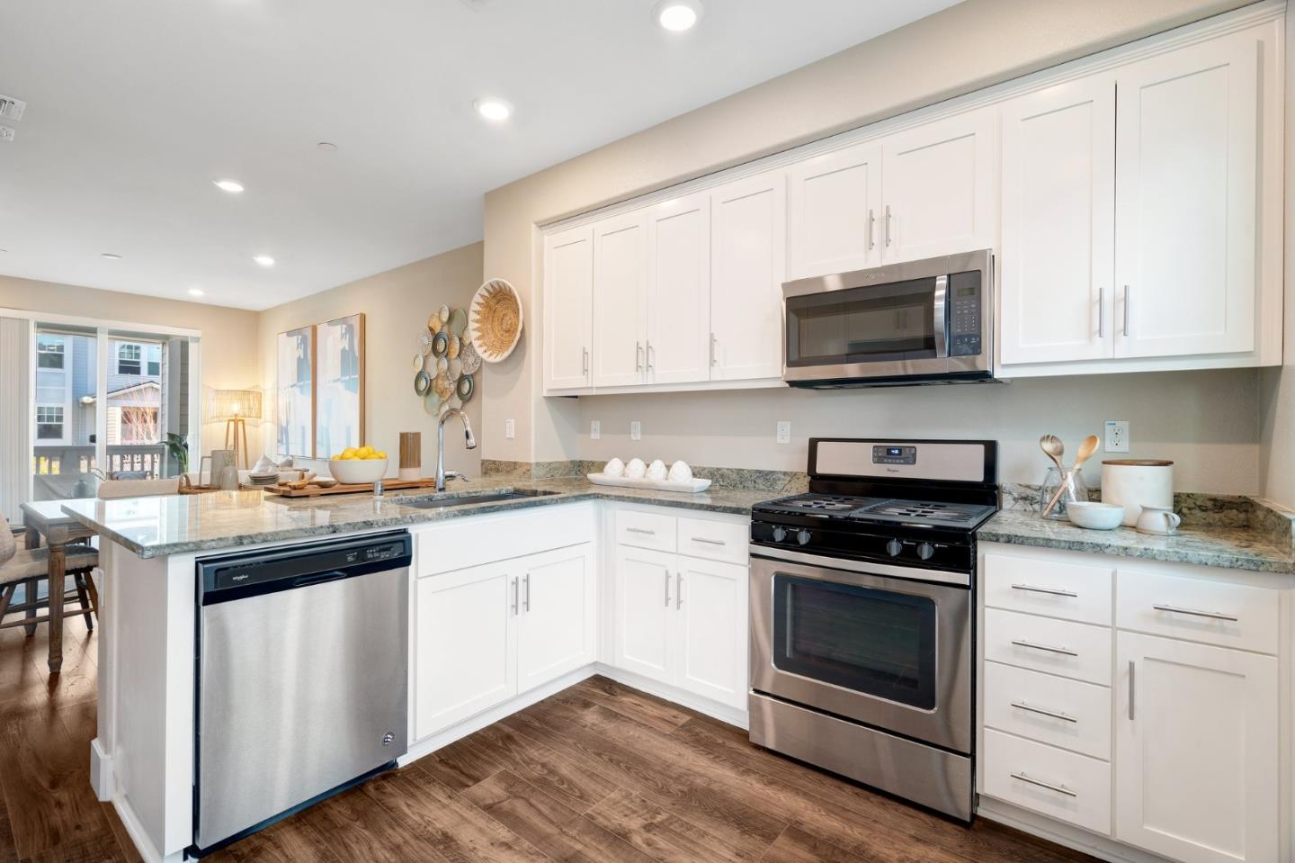 3911 Degree Lane Mountain View, CA 94043 - Photo 15 of 54 a kitchen with stainless steel appliances granite countertop a stove a sink and a microwave