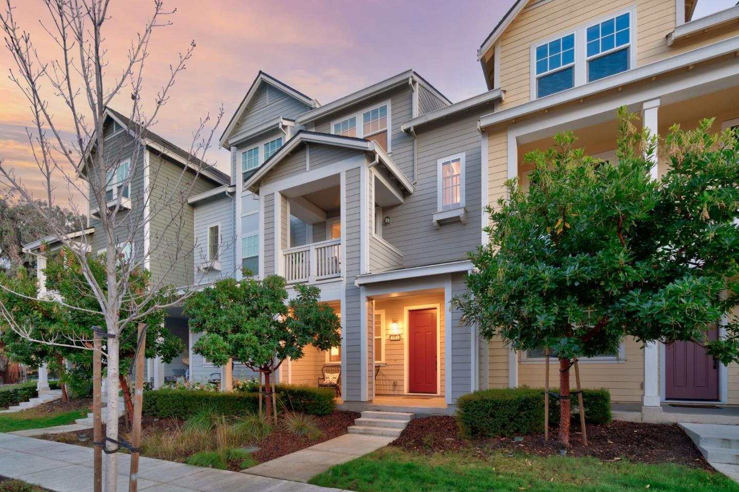 3911 Degree Lane Mountain View, CA 94043 - Photo 2 of 54 a front view of a house with a yard and trees