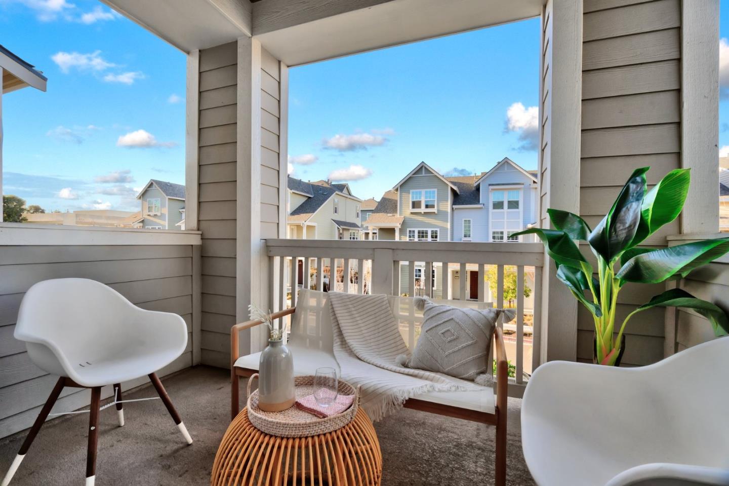 3911 Degree Lane Mountain View, CA 94043 - Photo 26 of 54 a balcony view with a couch and wooden floor