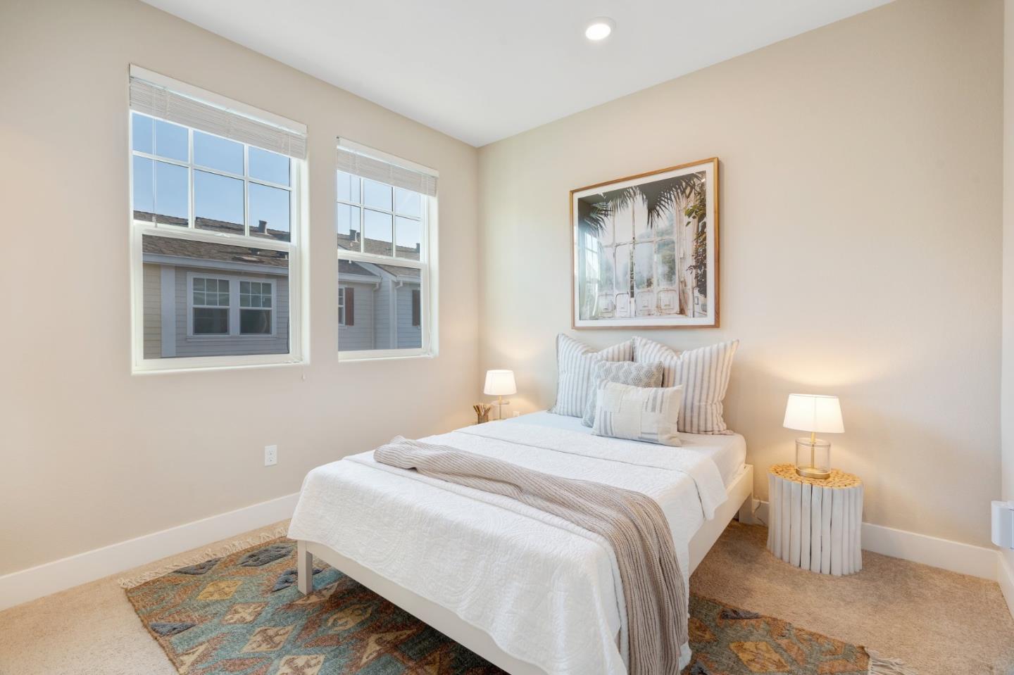 3911 Degree Lane Mountain View, CA 94043 - Photo 35 of 54 a bedroom with a bed and a painting on the wall