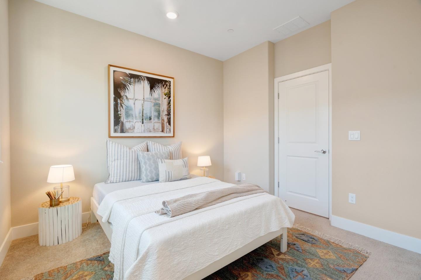 3911 Degree Lane Mountain View, CA 94043 - Photo 36 of 54 a bedroom with a bed and a lamp