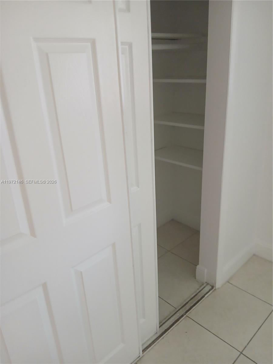 6471 Southwest 27th Street, Unit 2 Miramar, FL 33023 - Photo 35 of 41 a close view of walk in closet