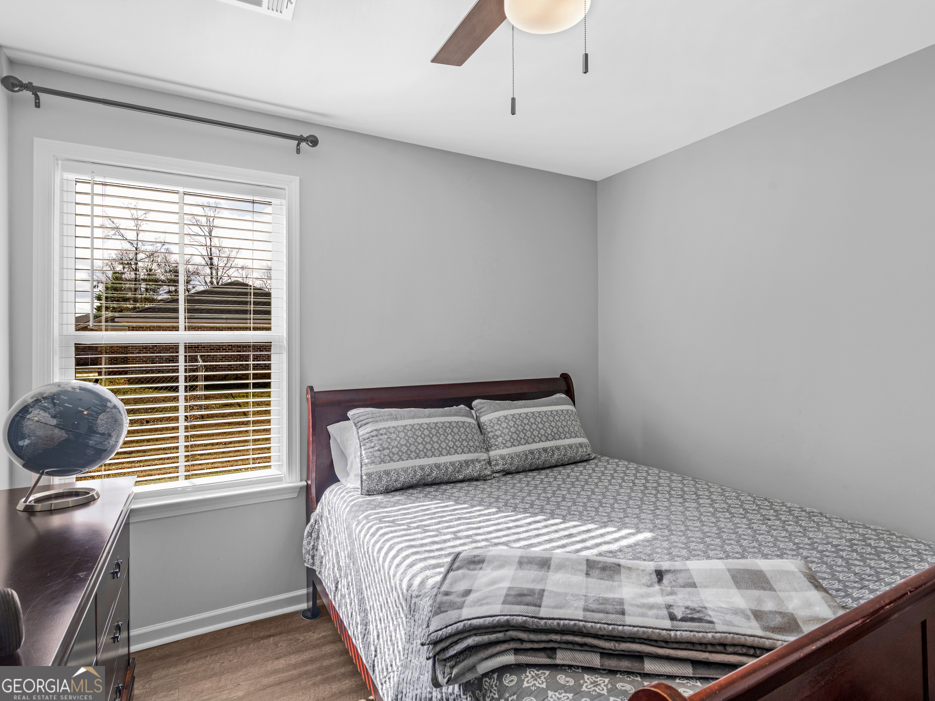 3524 Moss Island Court Albany, GA 31721 - Photo 14 of 25 a bedroom with a bed and a window