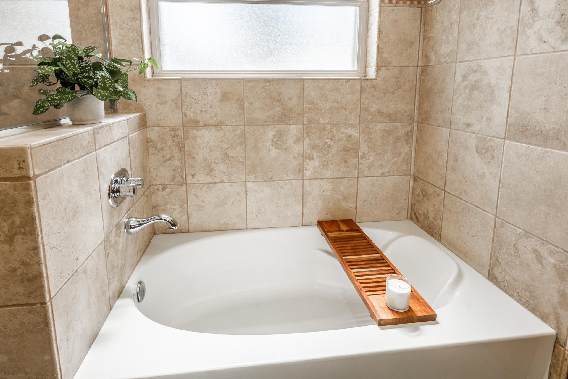 125 Davison Road, Unit 1 Mammoth Lakes, CA 93546 - Photo 21 of 46 a bath tub sitting in a bathroom next to a white sink