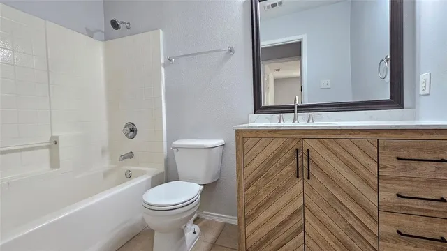 a bathroom with a sink a toilet and a bathtub