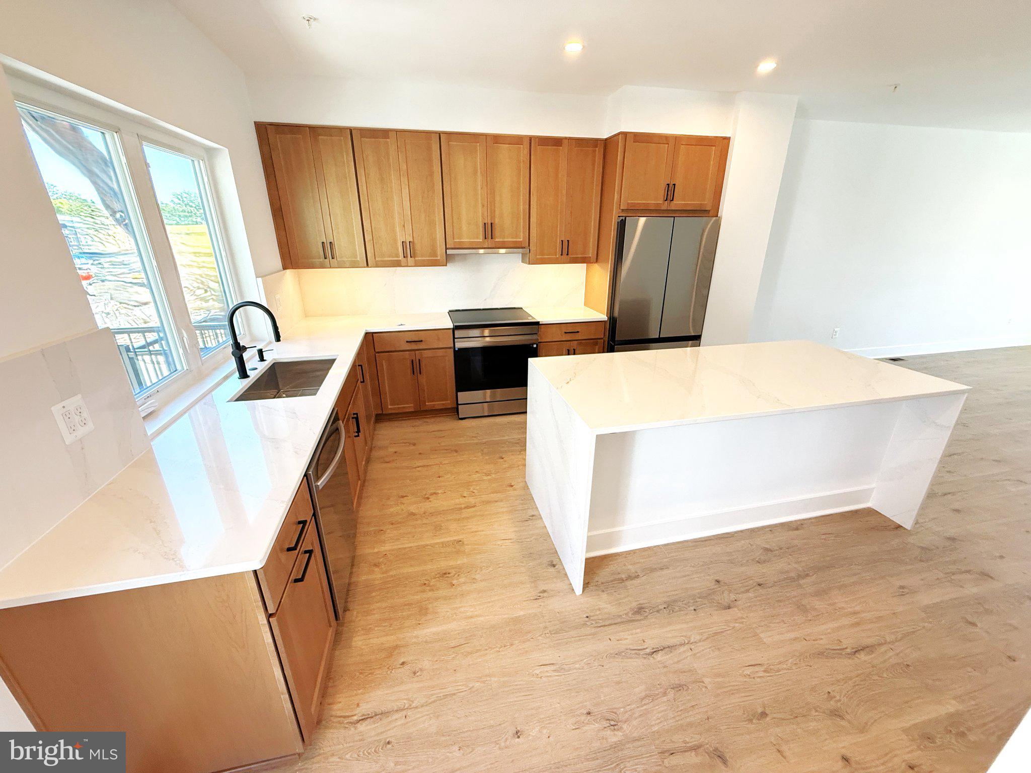 33 Lower Service Court Northwest Washington, DC 20001 - Photo 20 of 51 Modern kitchen with sleek finishes.