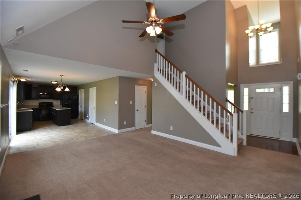 131 South Prince Henry Way Cameron, NC 28326 - Photo 2 of 26 a view of a livingroom with a ceiling fan and window