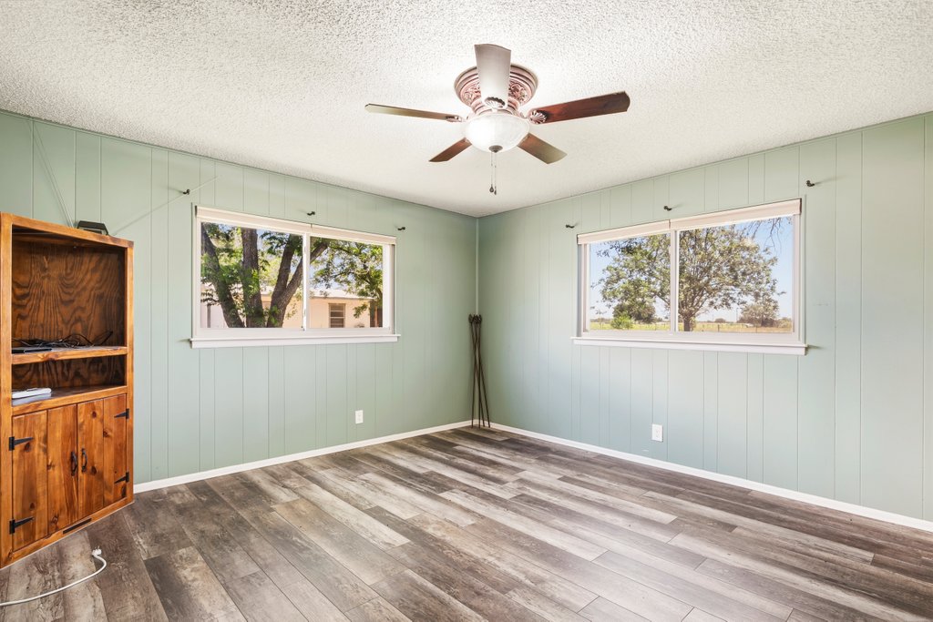1961 Bolton Road Marion, TX 78124 - Photo 11 of 17 a view of a bedroom with wooden floor and window