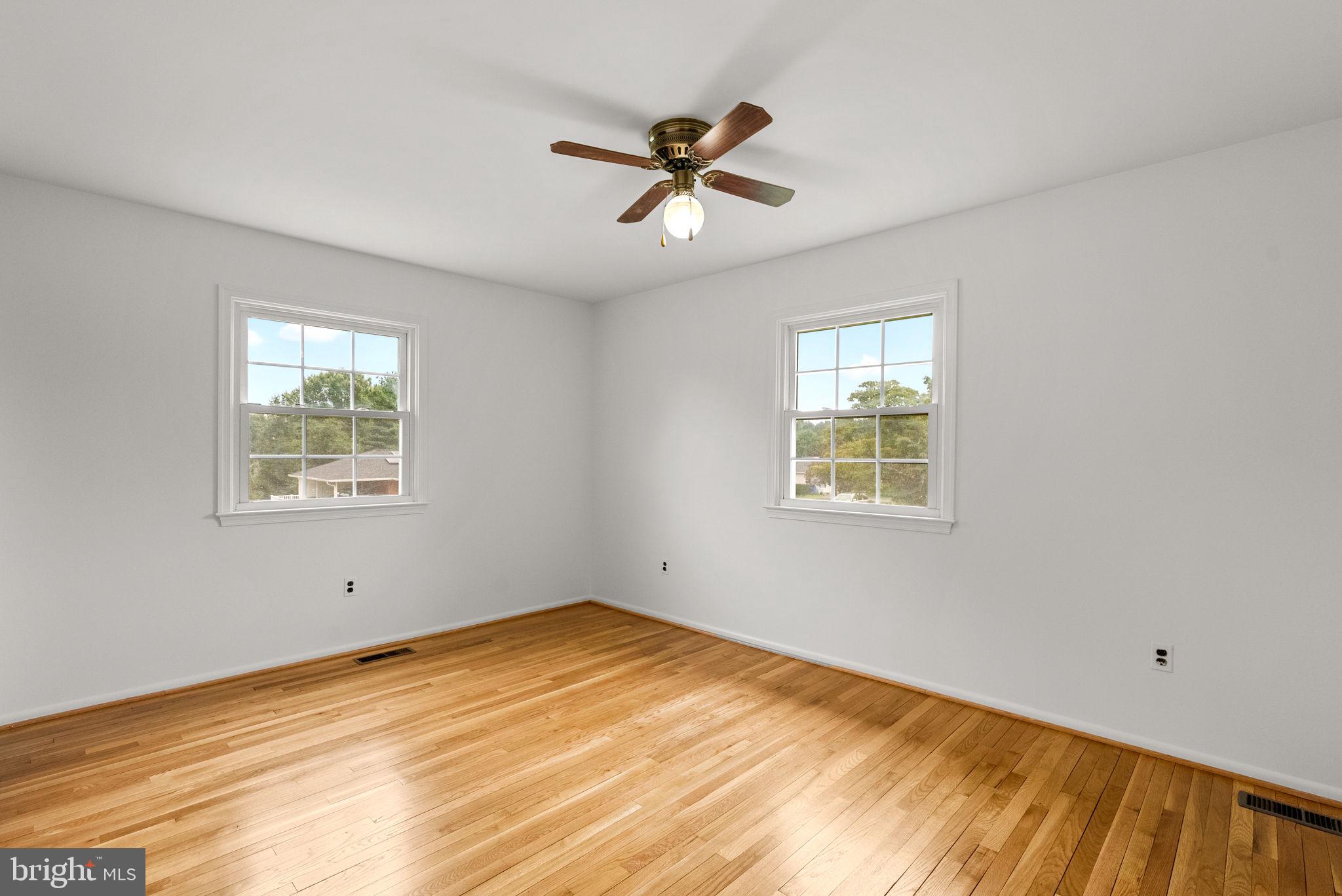 18724 Bloomfield Road Olney, MD 20832 - Photo 14 of 32 a view of an empty room with a window