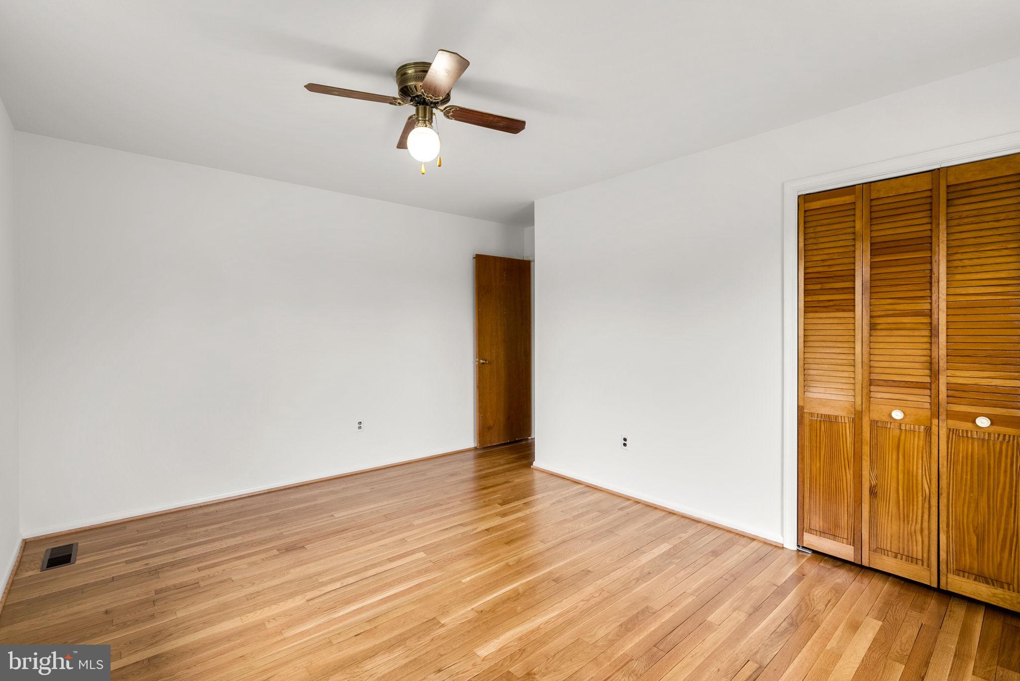 18724 Bloomfield Road Olney, MD 20832 - Photo 16 of 32 wooden floor in an empty room