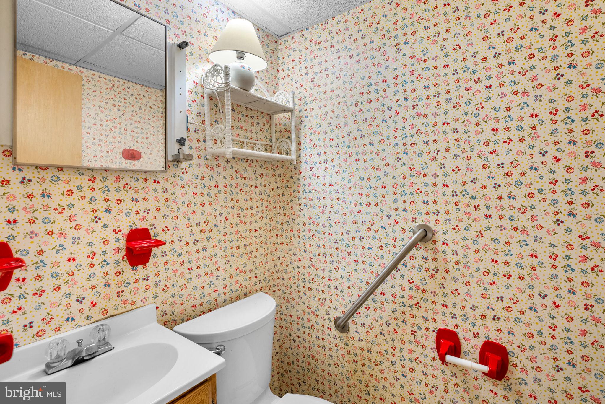 18724 Bloomfield Road Olney, MD 20832 - Photo 23 of 32 a bathroom with a sink toilet and shower