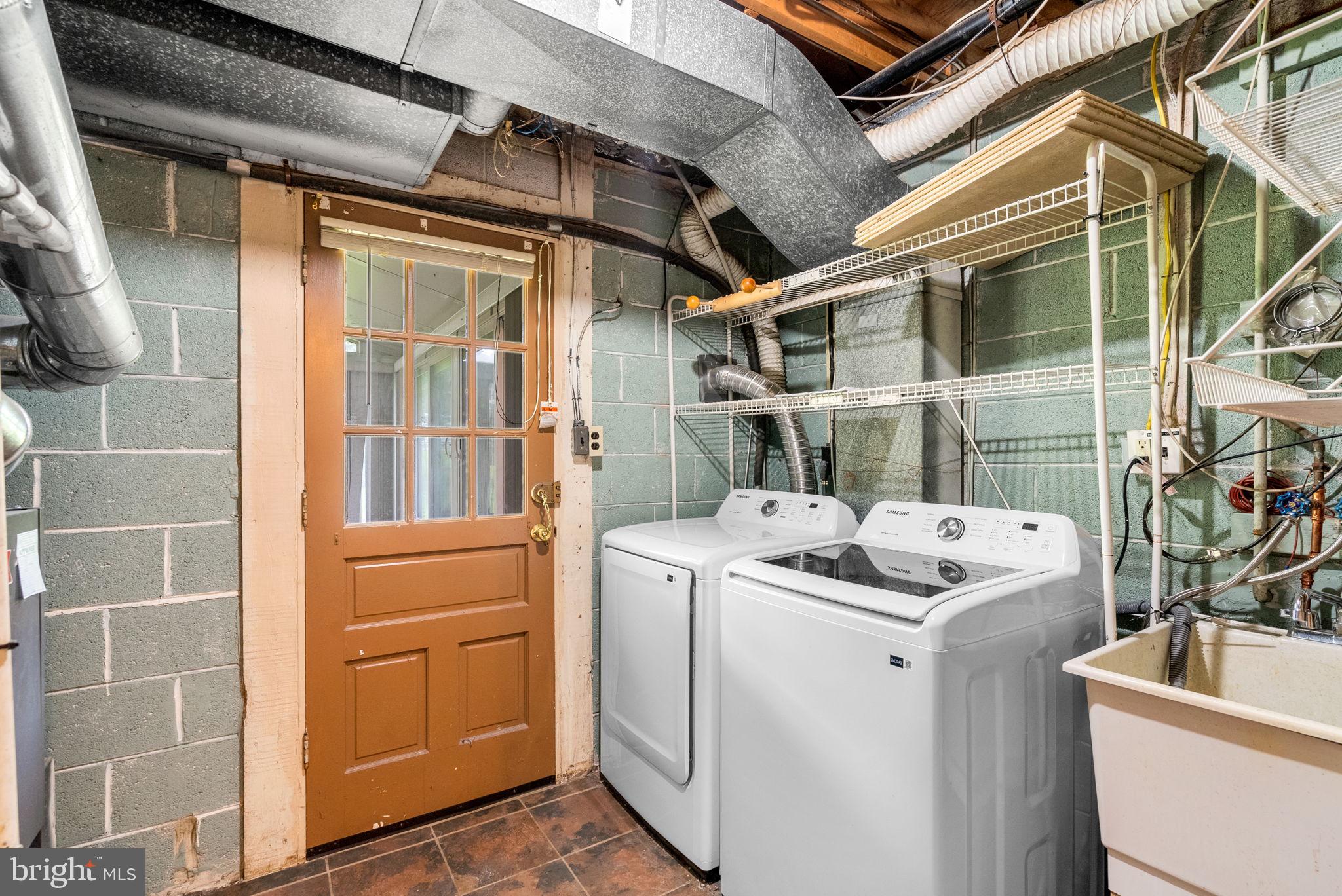 18724 Bloomfield Road Olney, MD 20832 - Photo 27 of 32 a utility room with dryer and washer