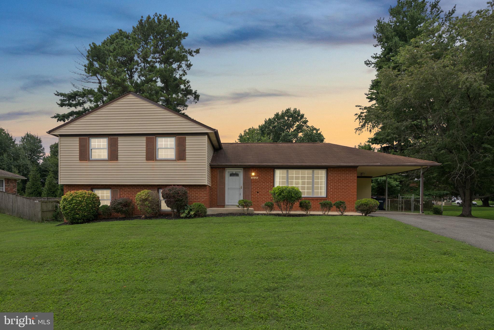 18724 Bloomfield Road Olney, MD 20832 - Photo 32 of 32 a front view of a house with a yard