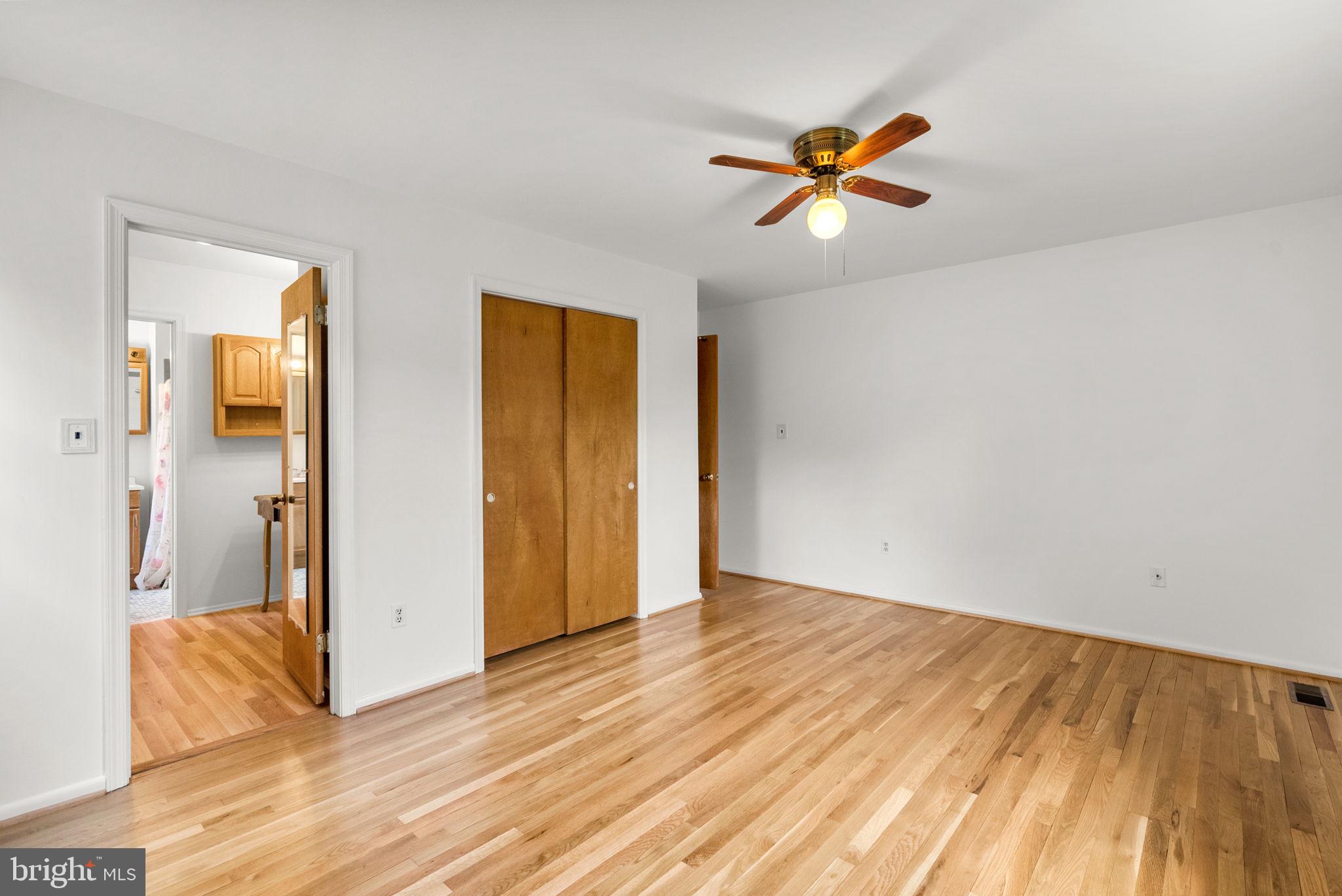18724 Bloomfield Road Olney, MD 20832 - Photo 10 of 32 a view of empty room with wooden floor