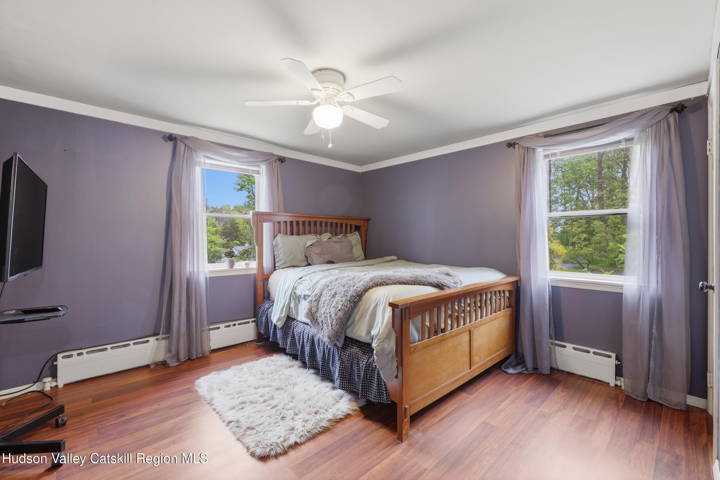 186 Cedar Hill Road High Falls, NY 12440 - Photo 16 of 33 a bed sitting in a spacious bedroom next to a window