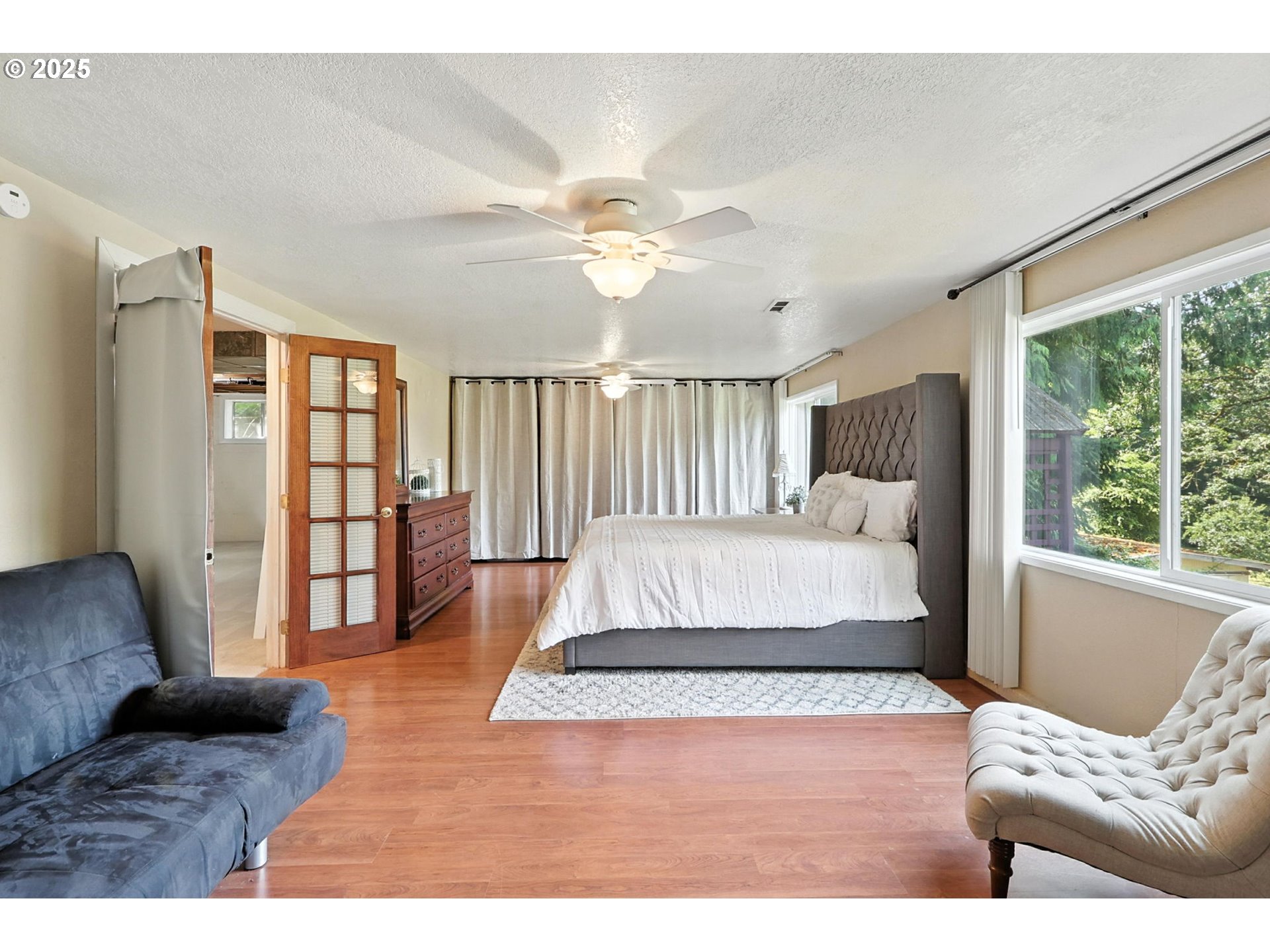 30083 Southeast Cemetery Road Estacada, OR 97023 - Photo 13 of 28 a living room with furniture and a large window