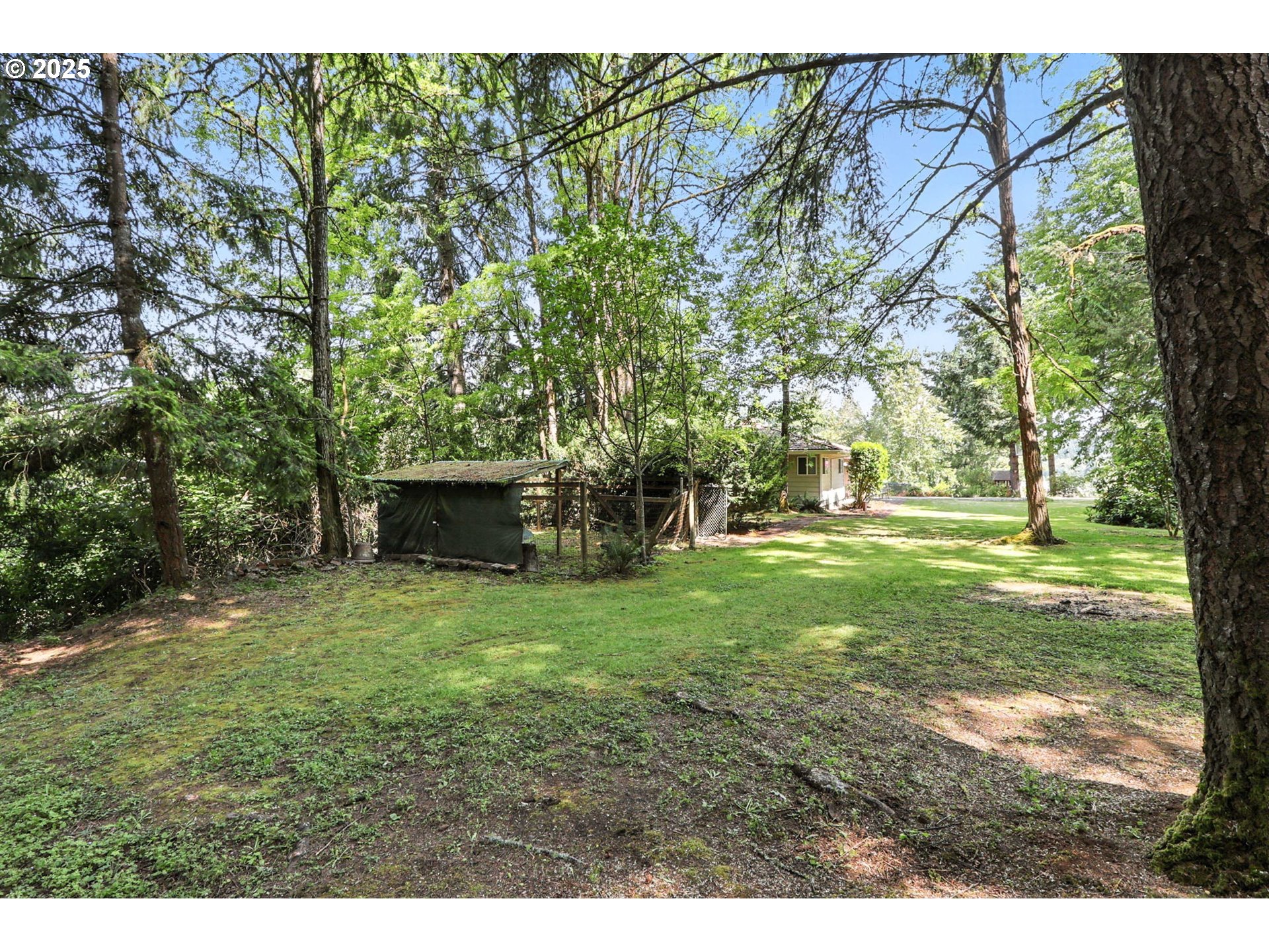 30083 Southeast Cemetery Road Estacada, OR 97023 - Photo 25 of 28 a backyard of a house with trees and outdoor seating