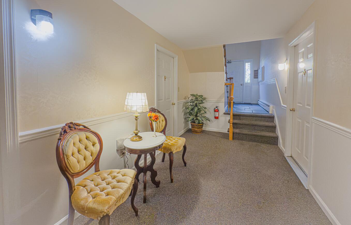 4622 Grandin Road Southwest Roanoke, VA 24018 - Photo 13 of 13 a view of a livingroom with furniture and a chair