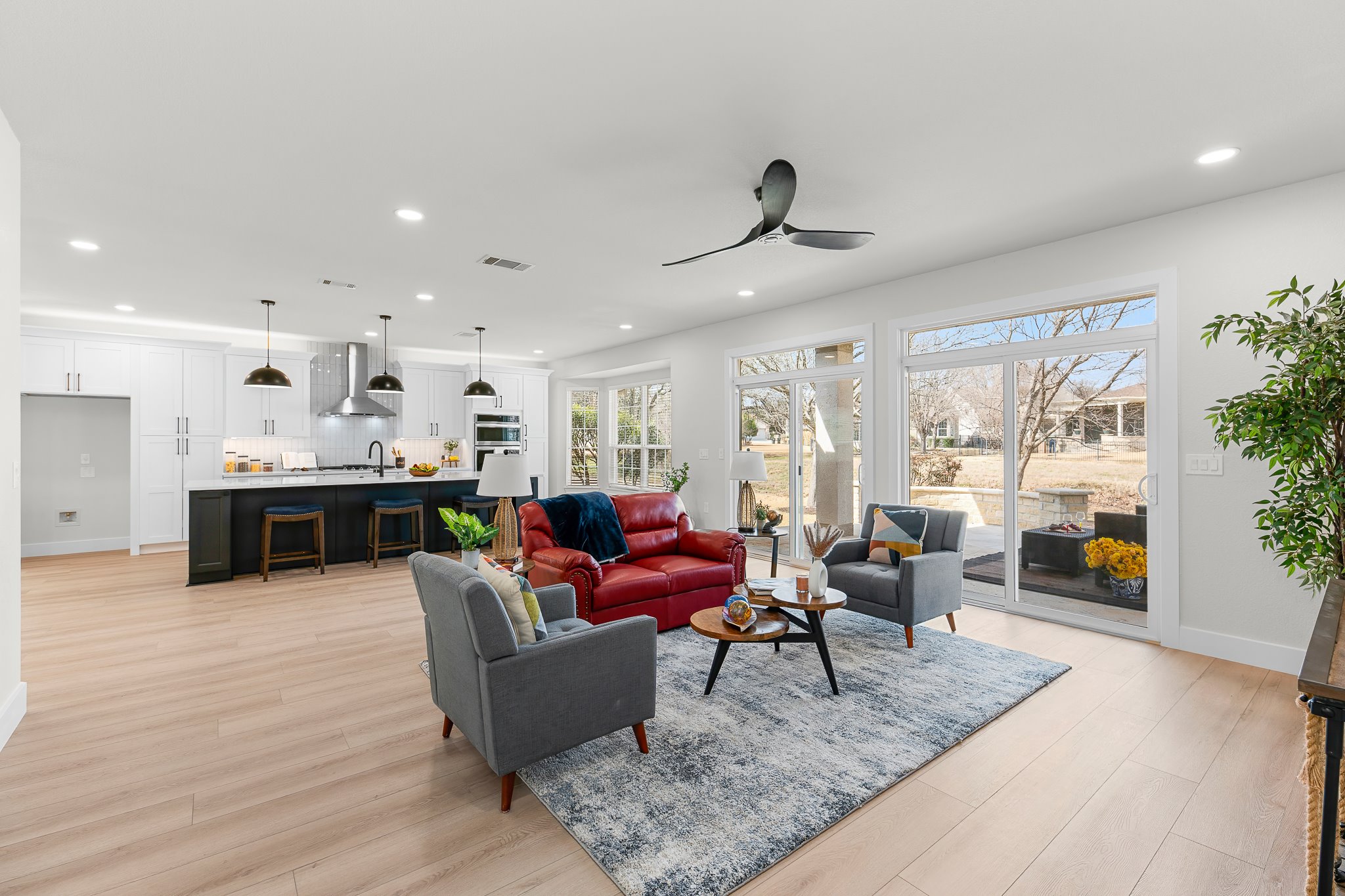 206 Armstrong Drive Georgetown, TX 78633 - Photo 14 of 39 a living room with furniture kitchen view and a large window