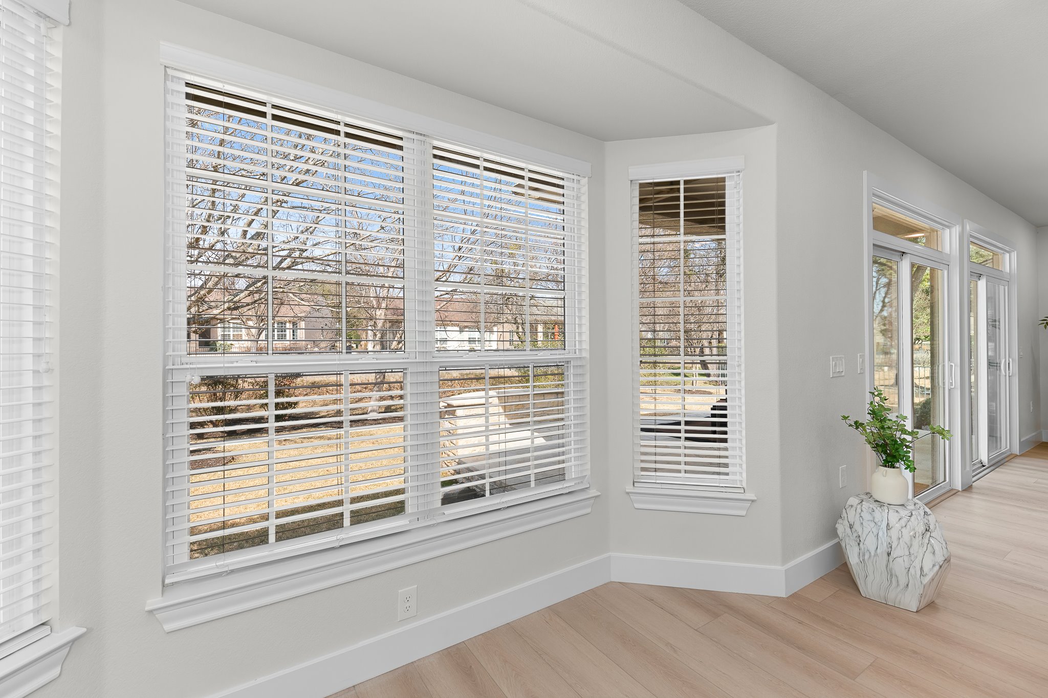 206 Armstrong Drive Georgetown, TX 78633 - Photo 16 of 39 a view of wooden floor and windows in a room