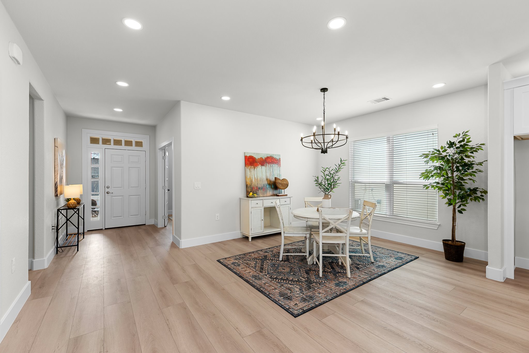 206 Armstrong Drive Georgetown, TX 78633 - Photo 17 of 39 a living room with furniture and a wooden floor
