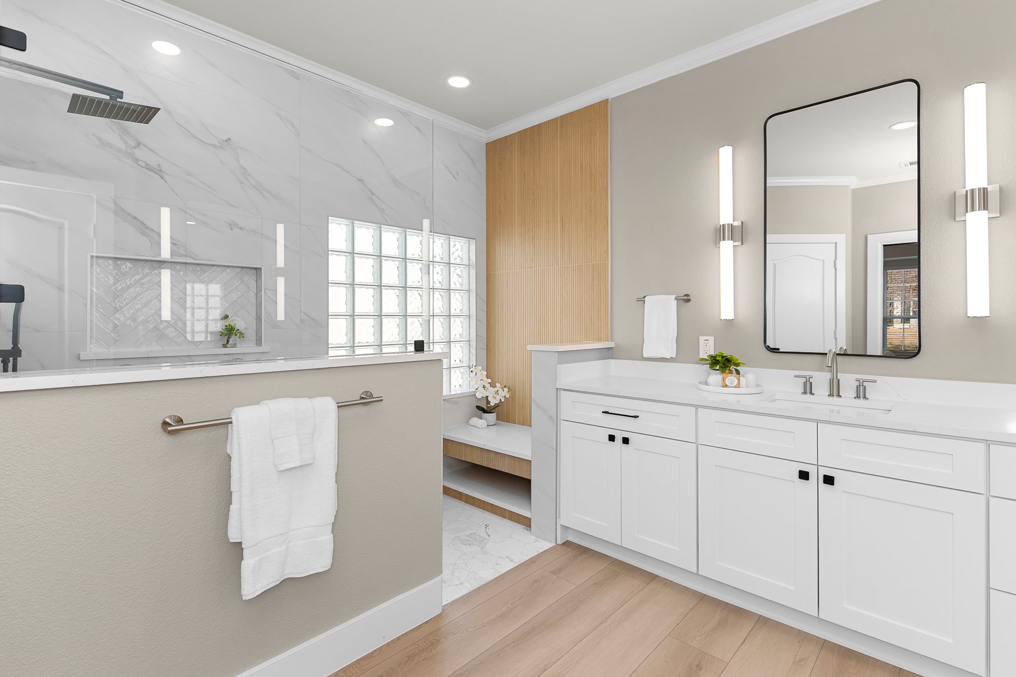 206 Armstrong Drive Georgetown, TX 78633 - Photo 2 of 39 a spacious bathroom with a double vanity sink a mirror and a bathtub