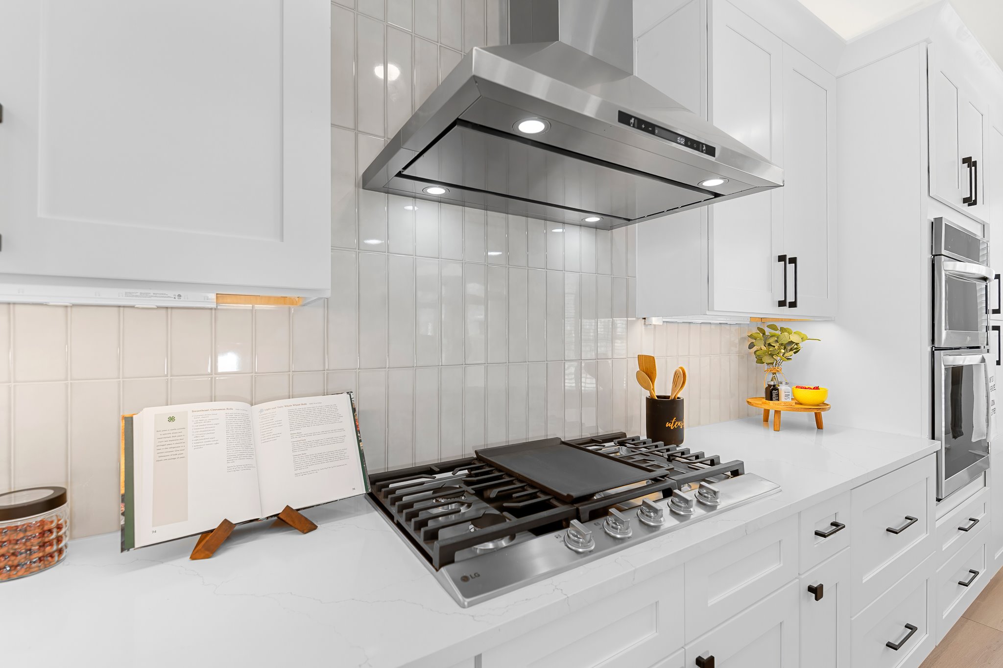 206 Armstrong Drive Georgetown, TX 78633 - Photo 24 of 39 a stove top oven sitting inside of a kitchen