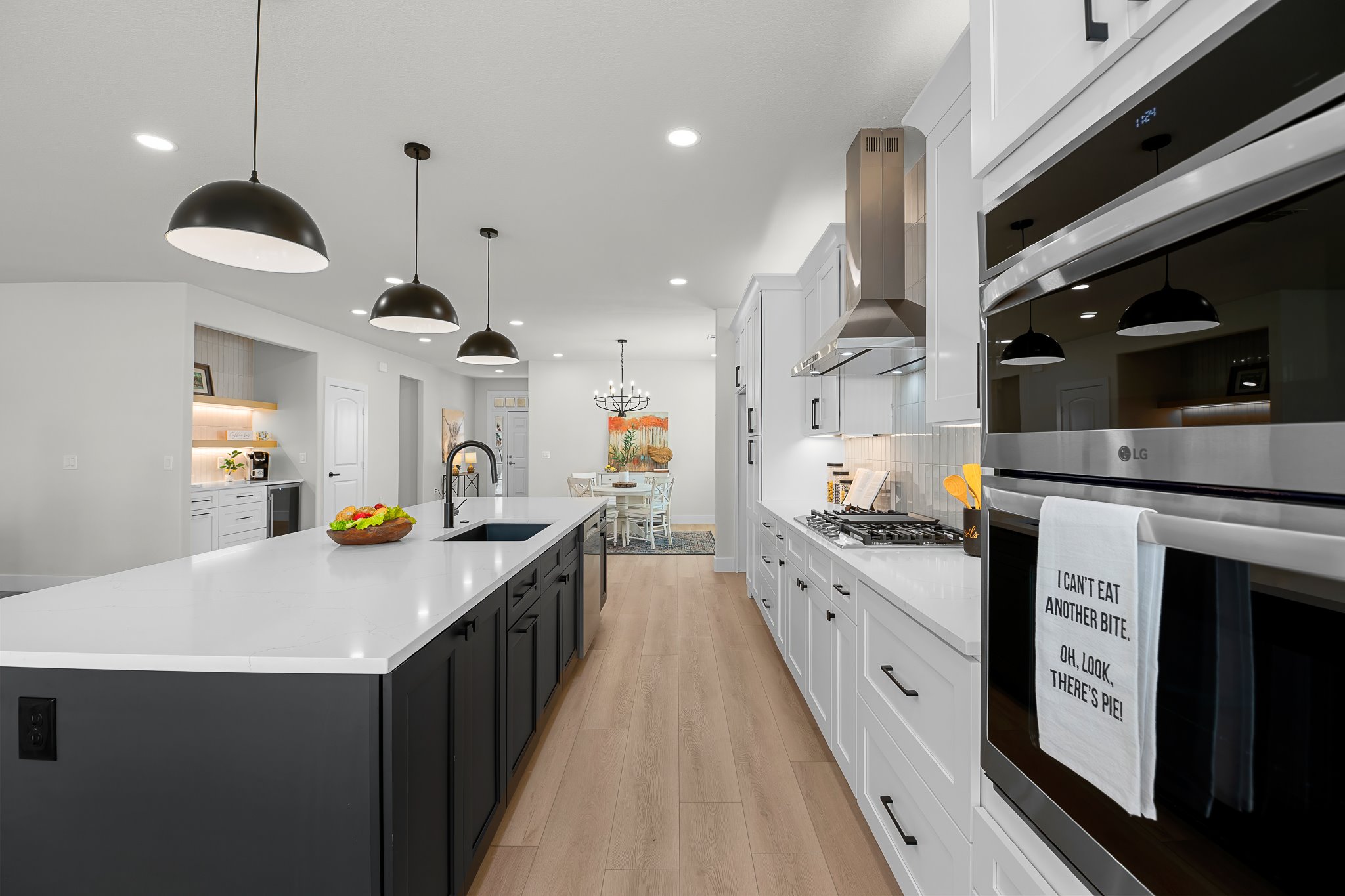 206 Armstrong Drive Georgetown, TX 78633 - Photo 26 of 39 a kitchen with stainless steel appliances granite countertop a sink a stove and a refrigerator