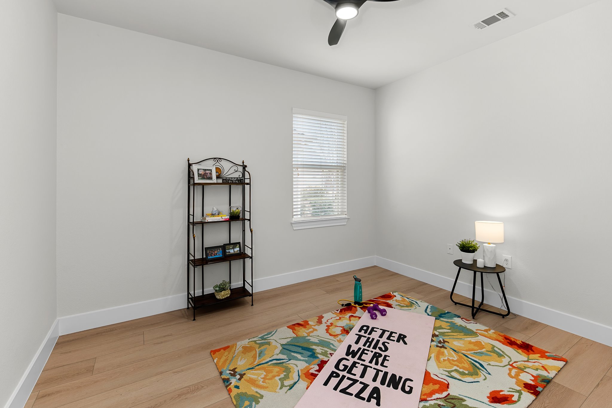 206 Armstrong Drive Georgetown, TX 78633 - Photo 29 of 39 an empty room with toys and wooden floor