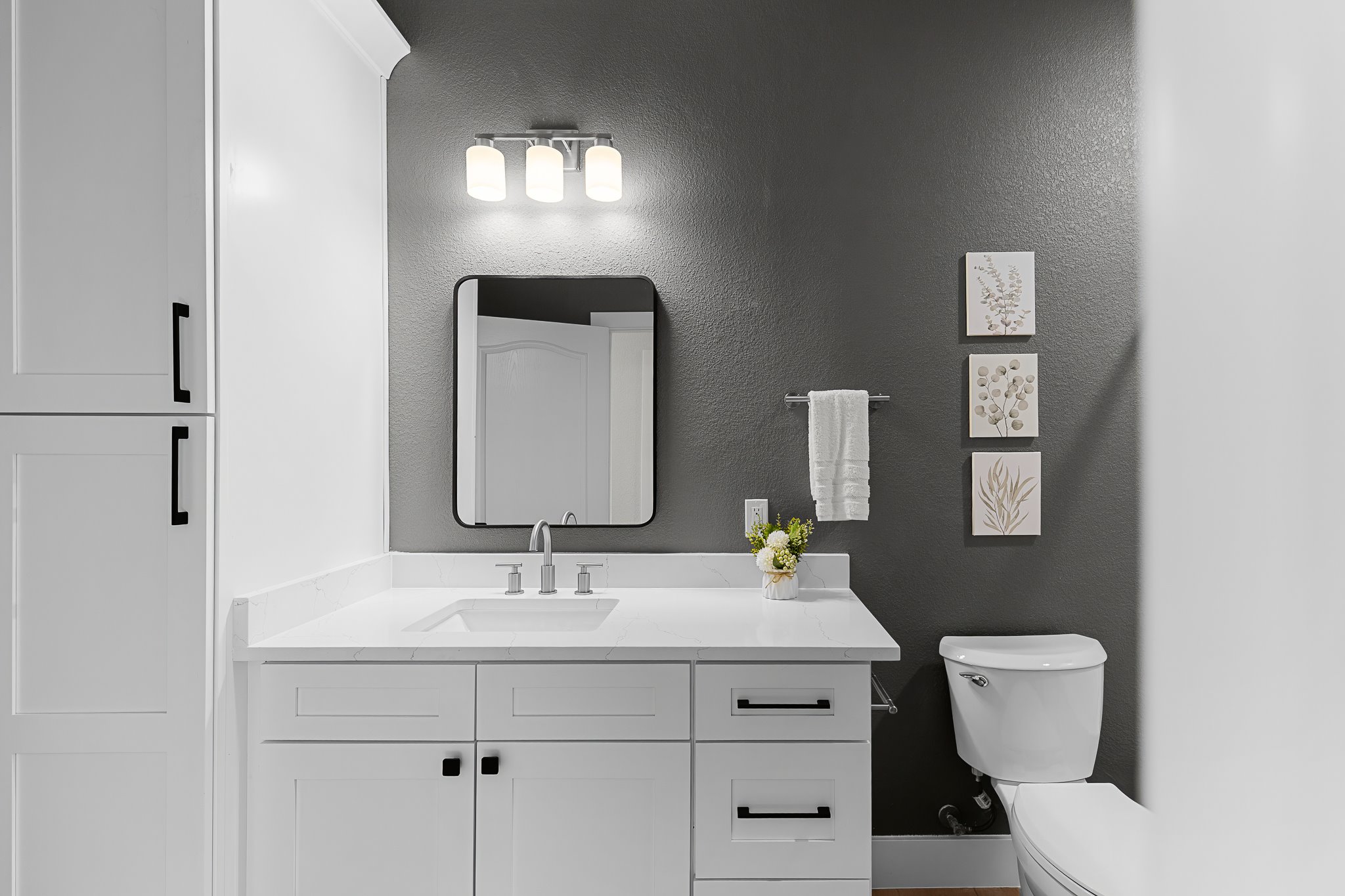 206 Armstrong Drive Georgetown, TX 78633 - Photo 31 of 39 a bathroom with a toilet sink and mirror