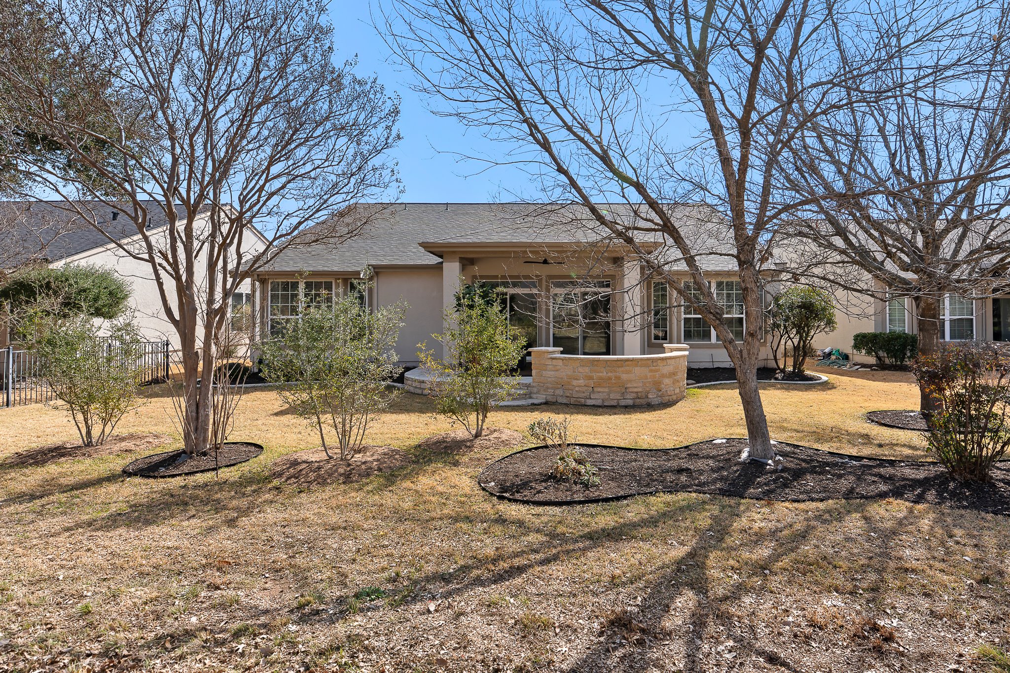 206 Armstrong Drive Georgetown, TX 78633 - Photo 36 of 39 a view of a house with backyard and trees