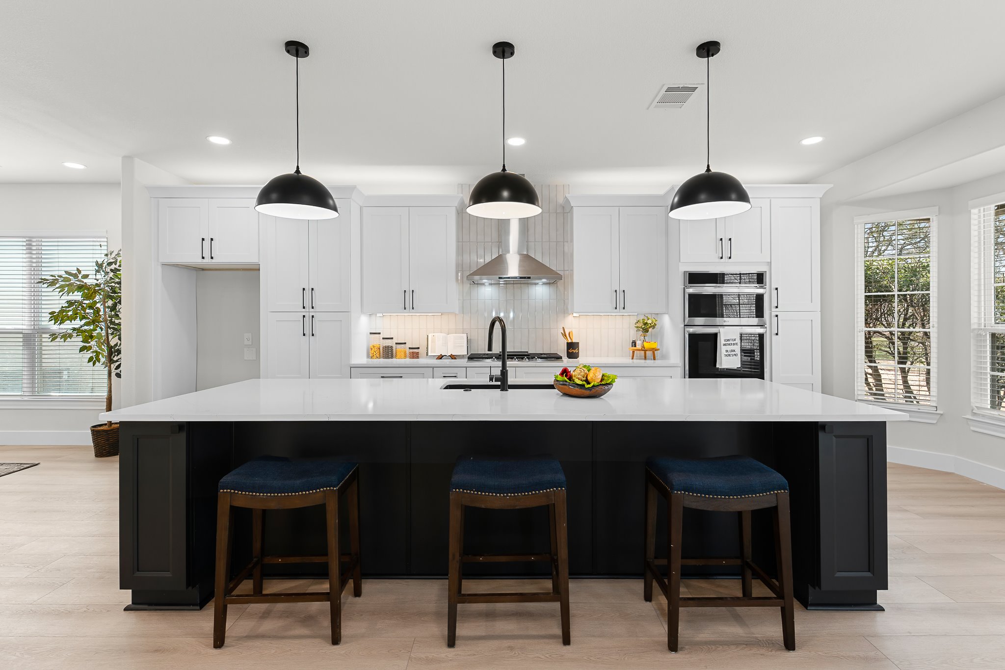 206 Armstrong Drive Georgetown, TX 78633 - Photo 5 of 39 a dining table chairs and window in a kitchen