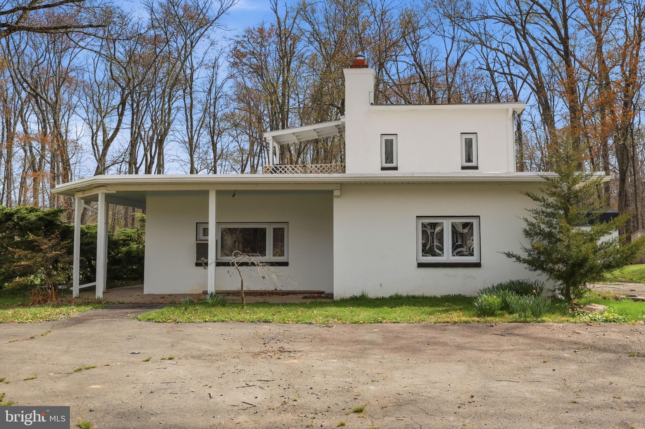 25 Diverty Road Pennington, NJ 08534 - Photo 1 of 26 Charming home nestled in nature's embrace.