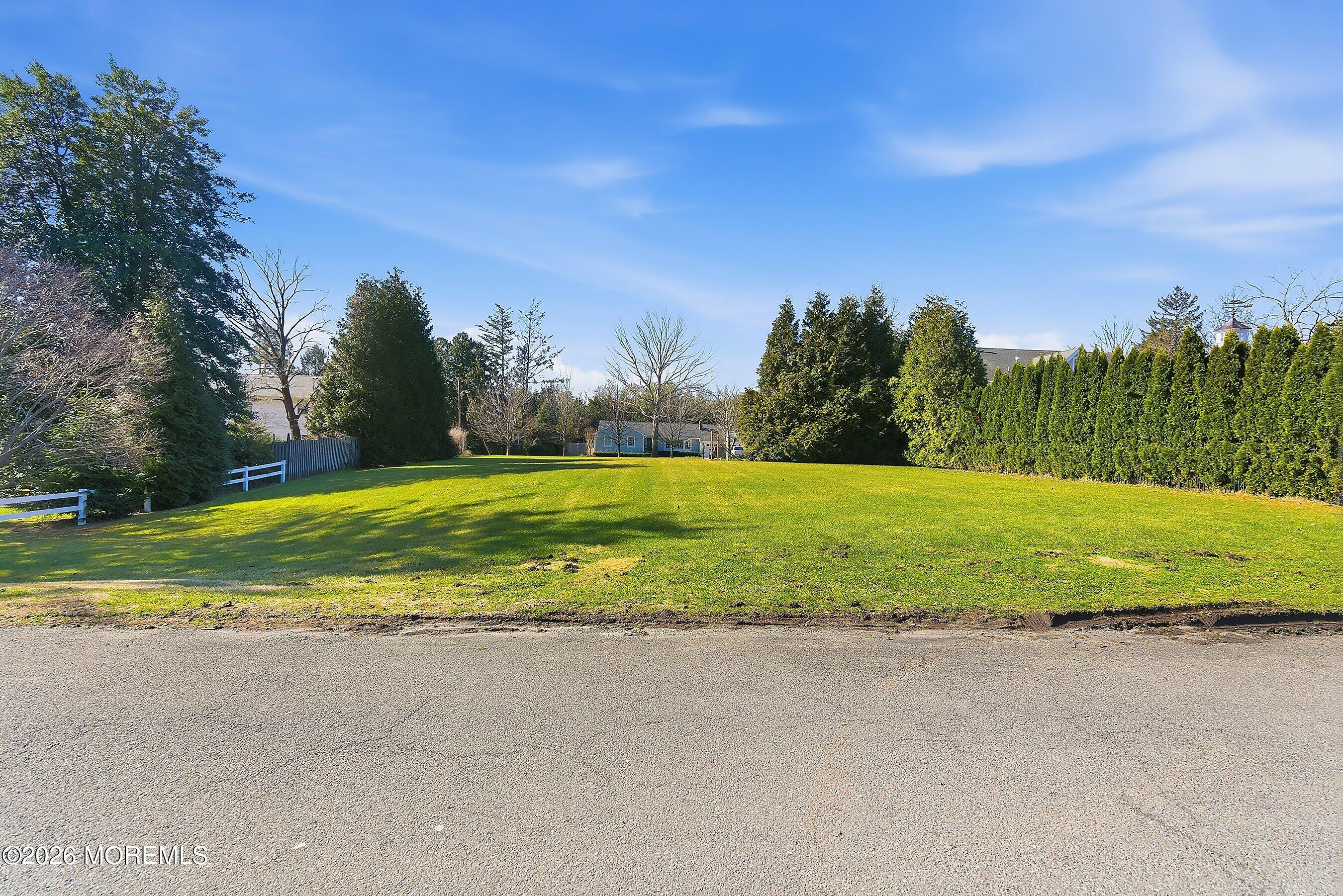 409 Laurel Avenue Brielle, NJ 08730 - Photo 17 of 17 a view of a swimming pool with an outdoor space and seating area