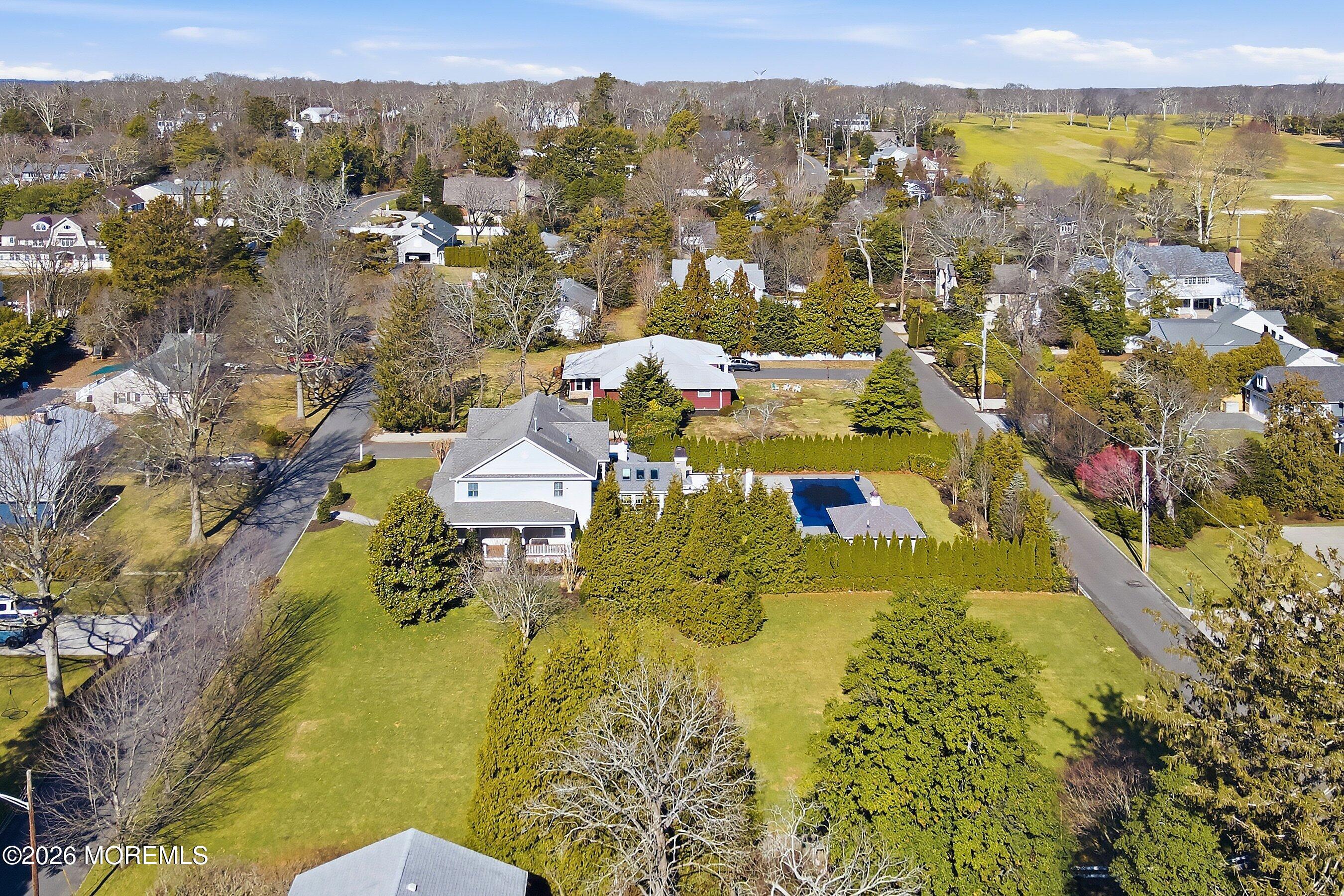 409 Laurel Avenue Brielle, NJ 08730 - Photo 9 of 17 a view of a swimming pool with a lake view