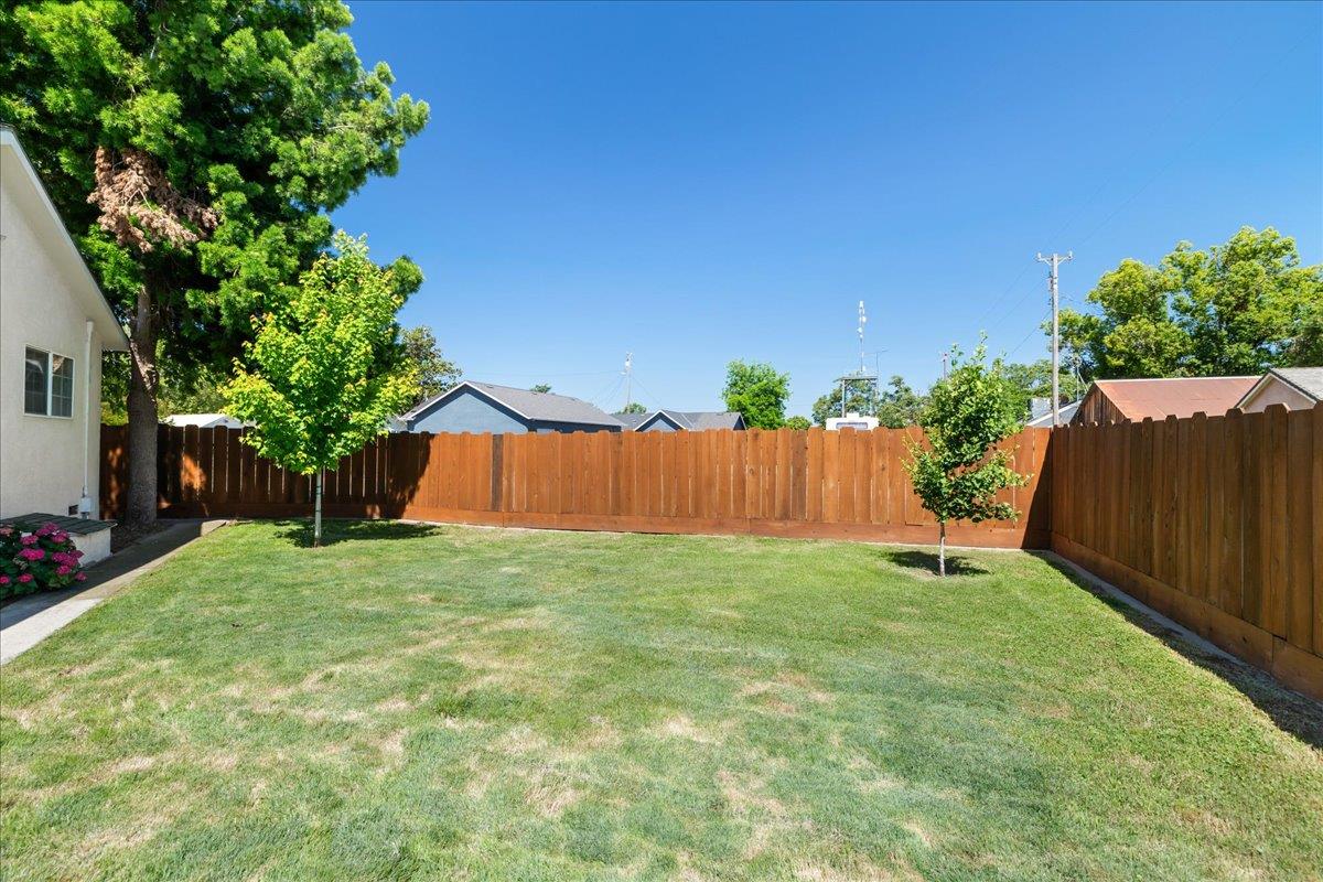 4701 Lone Tree Road Valley Home, CA 95361 - Photo 45 of 59 a view of a back yard