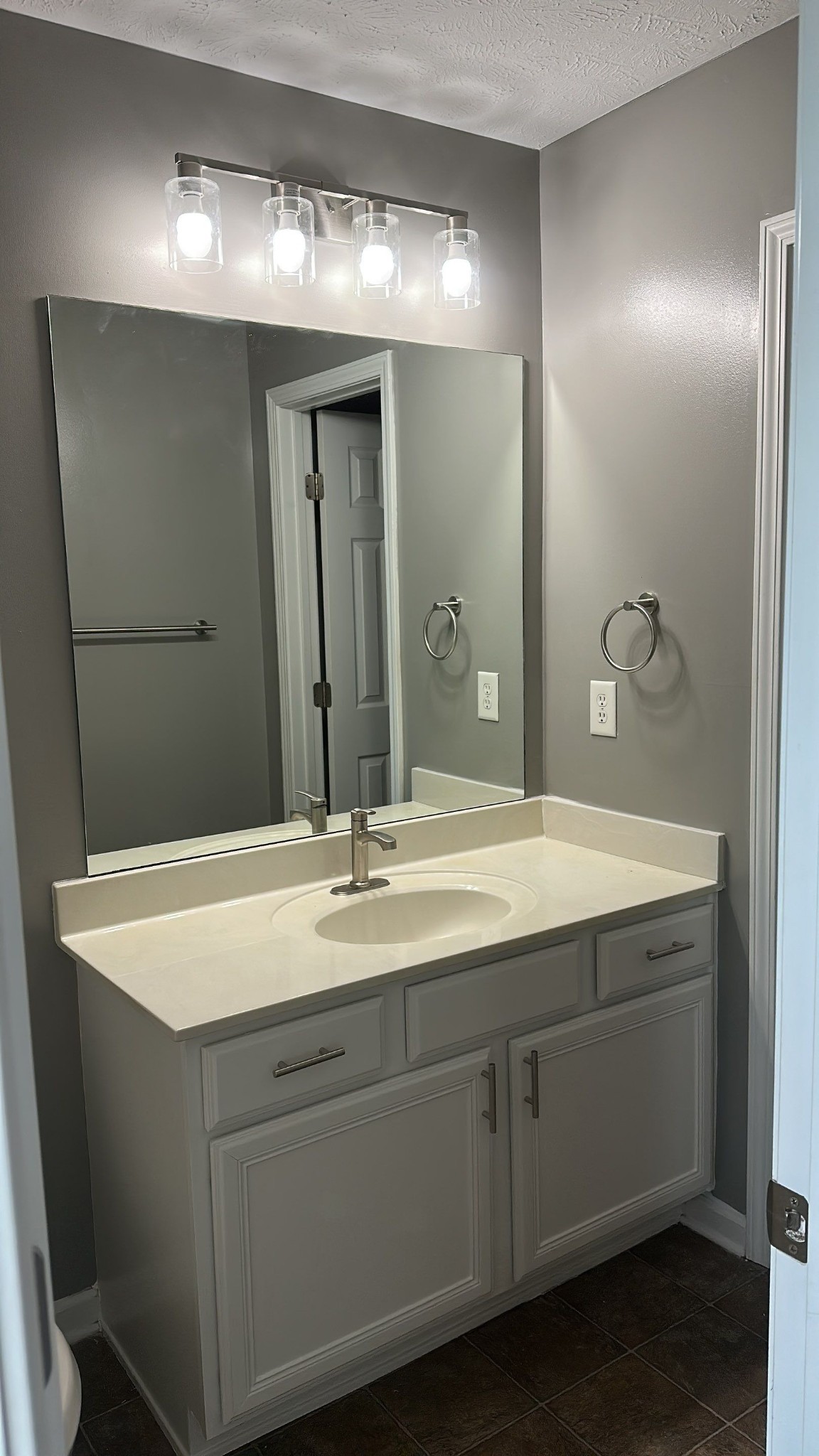 4020 Pavati Trace Spring Hill, TN 37174 - Photo 12 of 19 a bathroom with a sink and a mirror