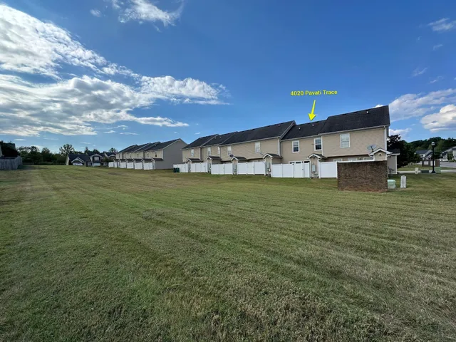 a view of a lake with a big yard