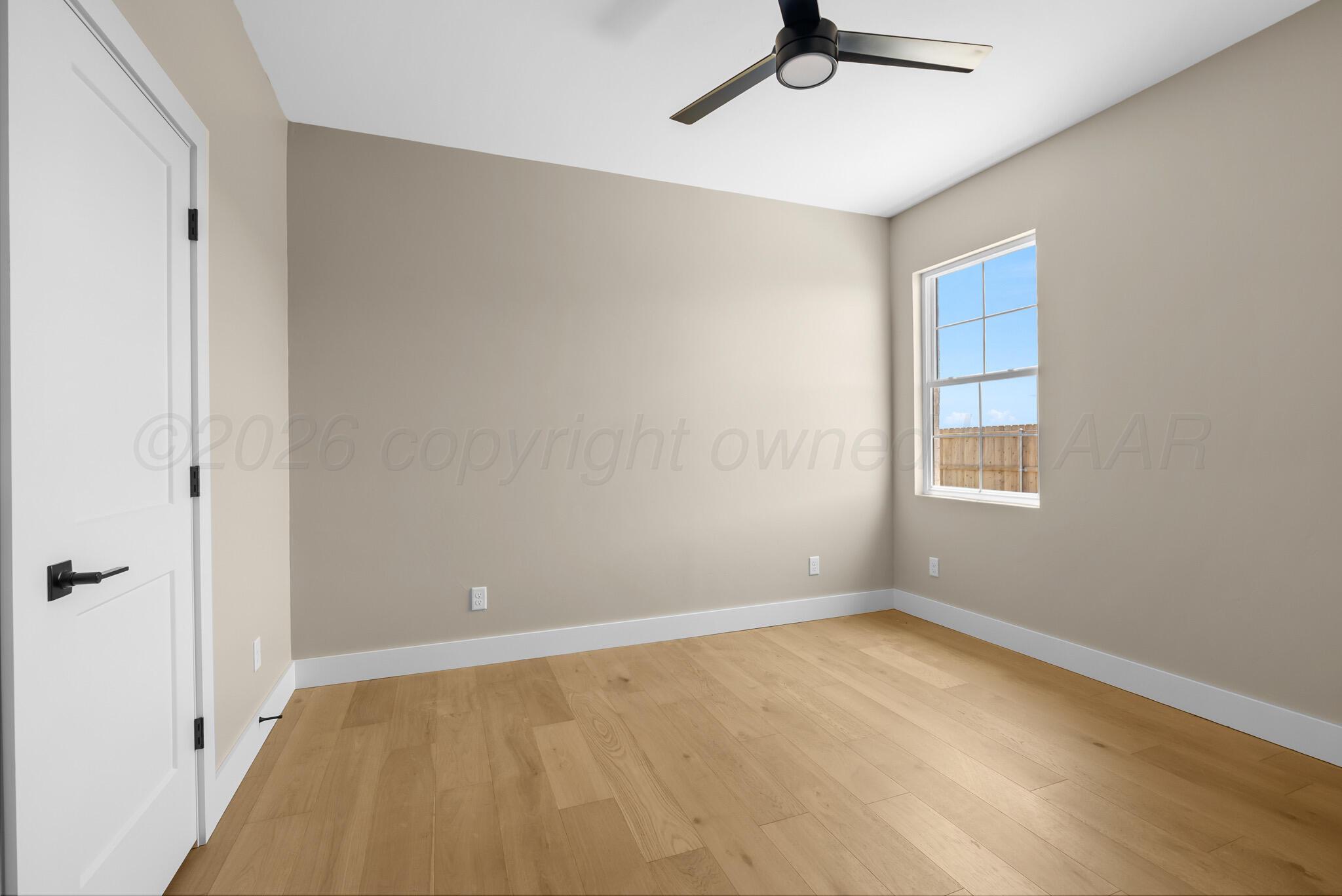 4201 Juniper Springs Road Amarillo, TX 79119 - Photo 25 of 27 a view of an empty room with a window