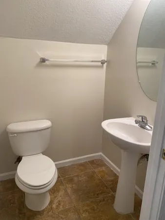 a bathroom with a sink and a toilet