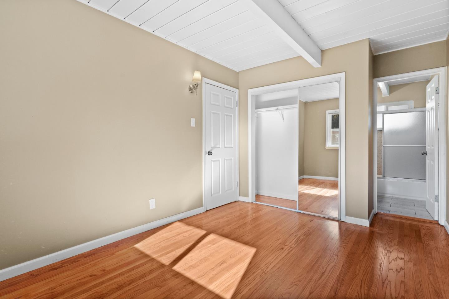 4 Coleman Place Menlo Park, CA 94025 - Photo 13 of 34 a view of a room with wooden floor and a bathroom